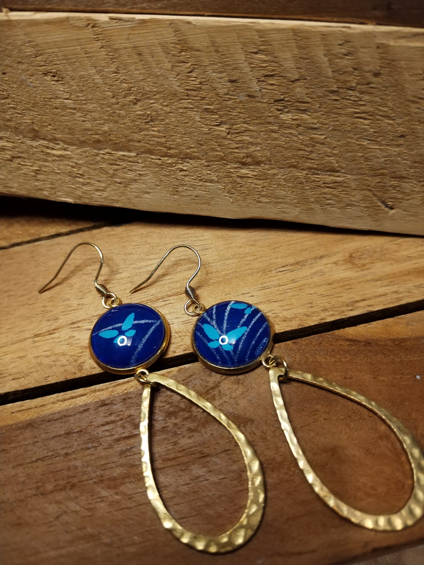 Boucle d'oreille acier doré papier papillon