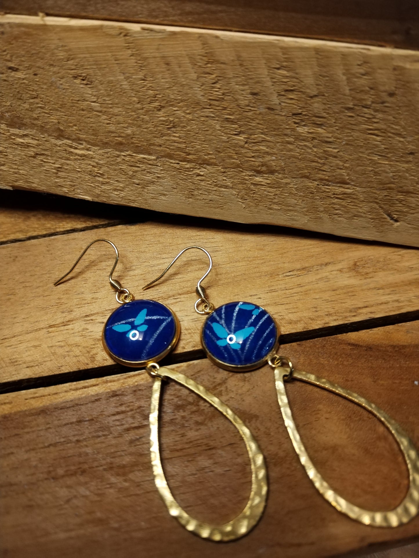 Boucle d'oreille acier doré papier papillon