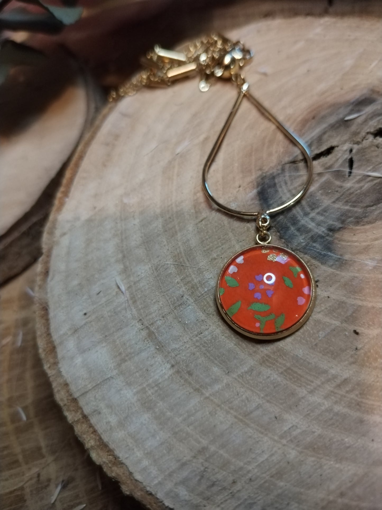 Collier acier doré -orange