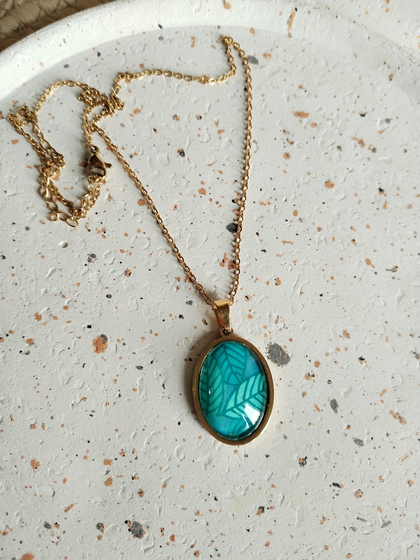 Collier acier doré papier turquoise
