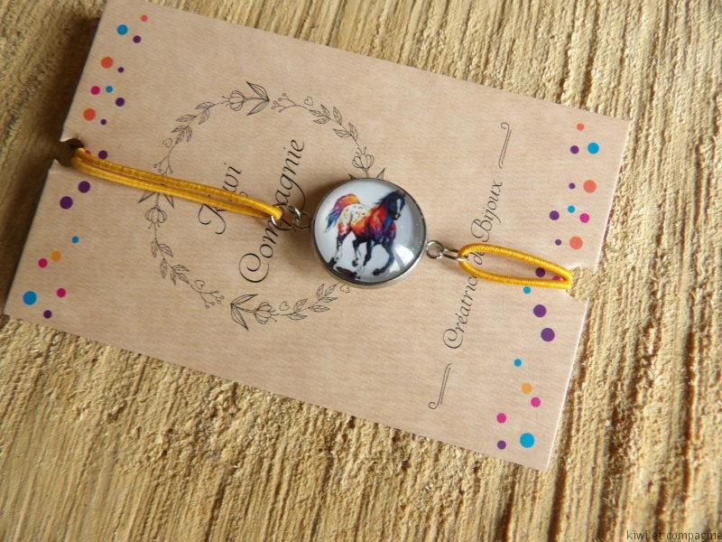 Bracelet élastique orange avec cabochon cheval 14mm