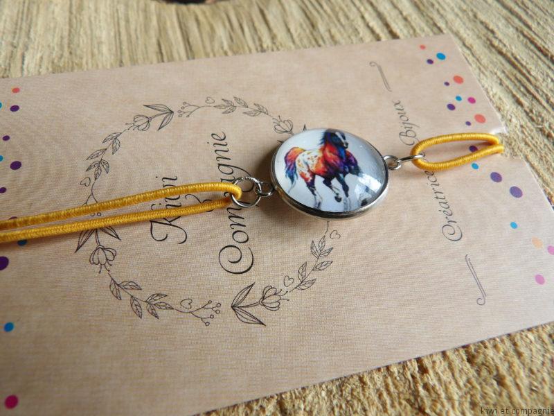 Bracelet élastique orange avec cabochon cheval 14mm