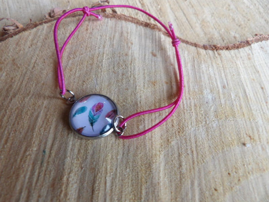 Bracelet élastique rose avec cabochon feuilles