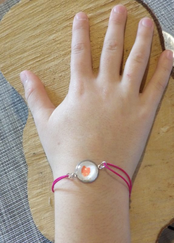 Bracelet élastique couleur rose avec cabochon 14mm - papier japonais fond rose et fleur orange