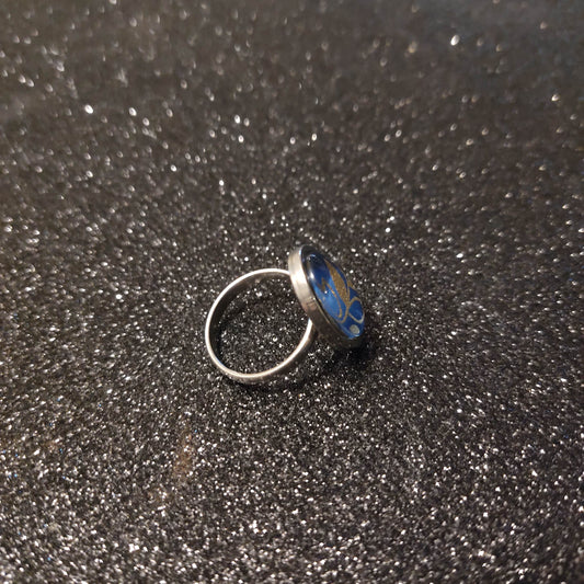 Bague cabochon ovale de 13x18mm - feuille dorée et bleu nuit - acier inoxydable doré