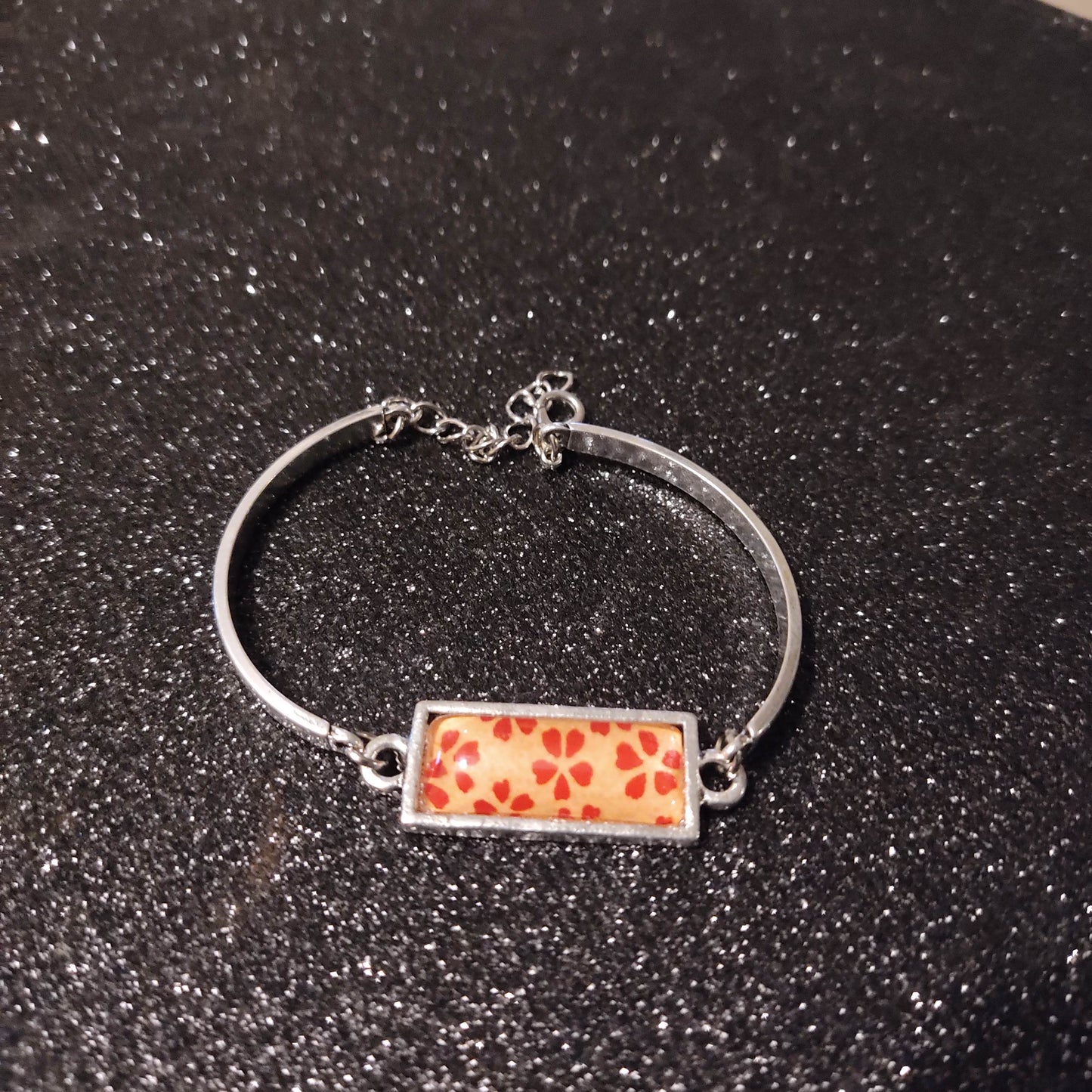 Bracelet rigide acier inoxydable - rectangulaire 10x25mm - Fleurs rouges et rose