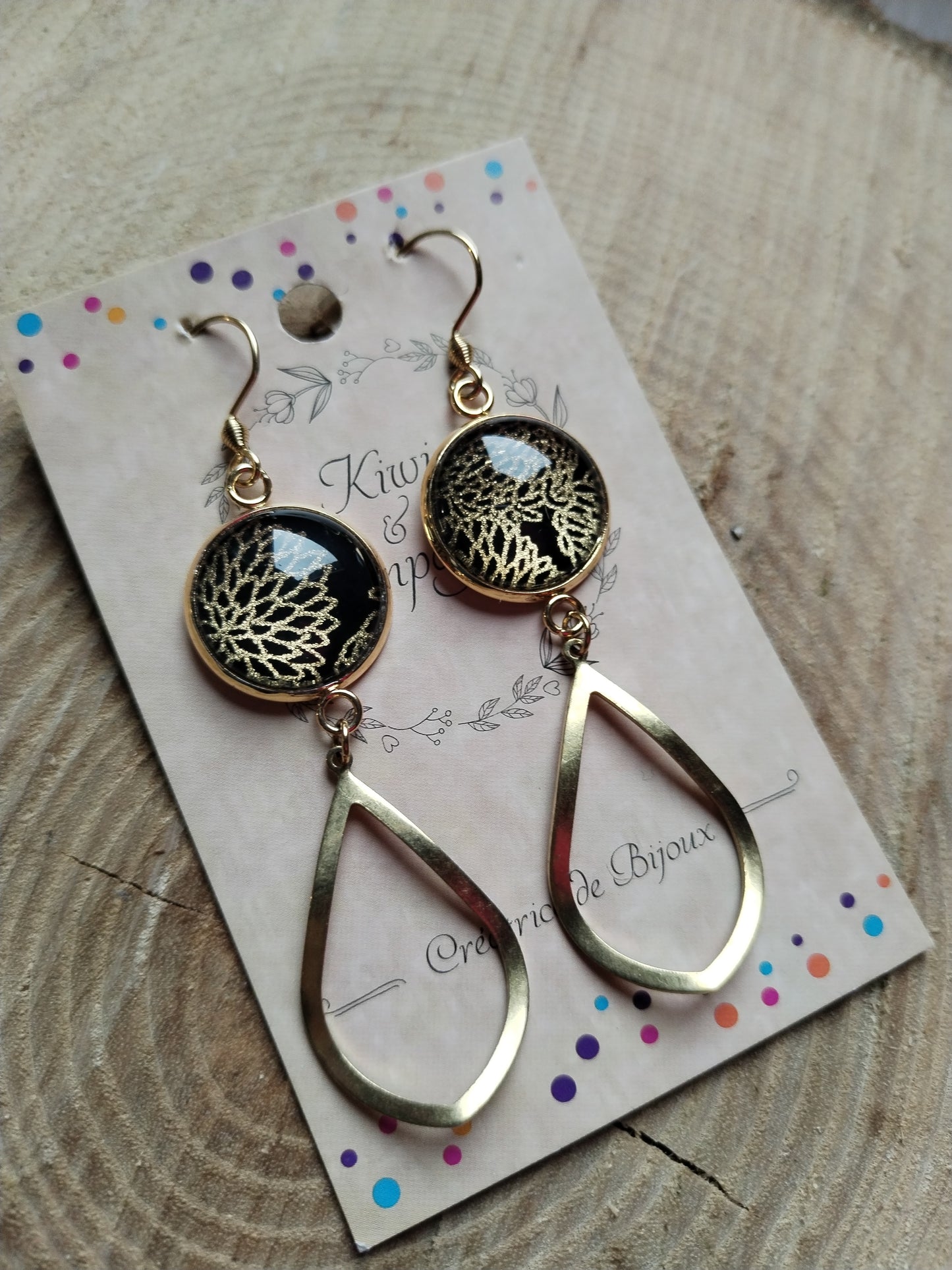 Boucles d'oreilles longues noires et dorées
