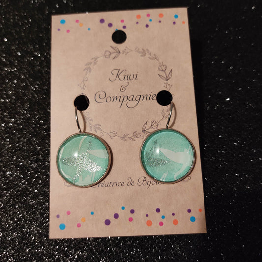 Boucles d'oreilles dormeuses rondes 18mm - Acier inoxydable - grues blanches et pailleté, fond vert eau