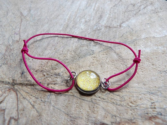 Bracelet élastique rose avec cabochon jaune 12mm