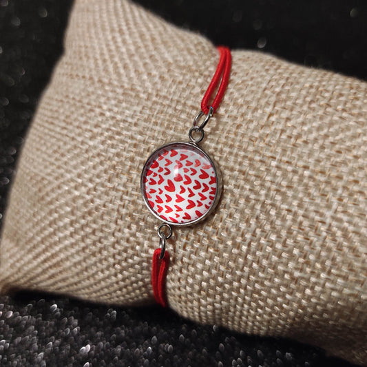 Bracelet élastique couleur rouge avec cabochon 14mm - coeurs