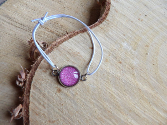 Bracelet élastique blanc avec cabochon rose 12mm