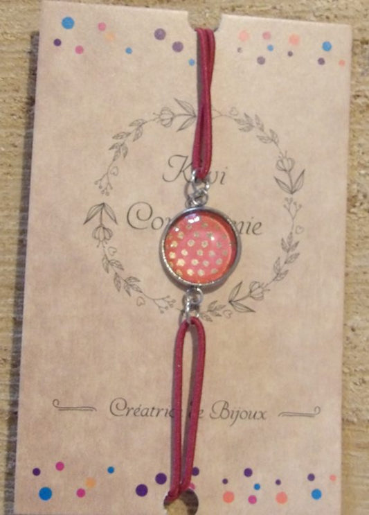 Bracelet élastique couleur bordeau avec cabochon 12mm - fond rose, pois dorés
